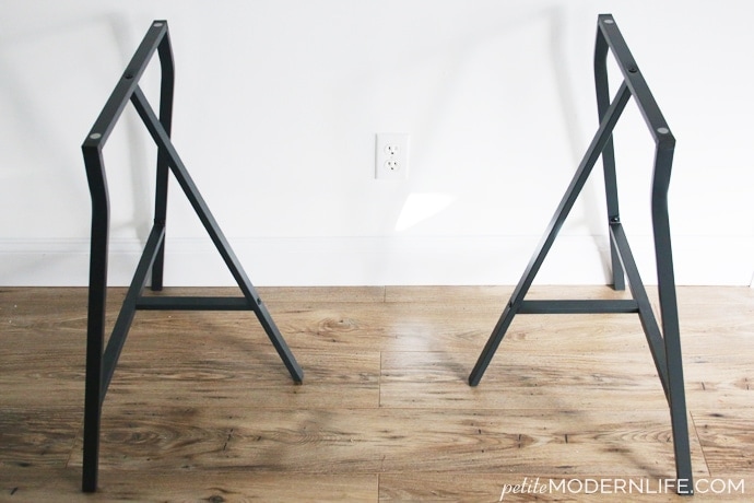 Build your own modern + sleek desk for as low as $26 (like this pretty one with trestle legs + white table top!)