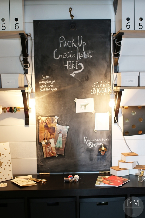 An amazing DIY fold down sewing table that doubles as a cute chalkboard! Such a space saver (as well as easy/inexpensive)