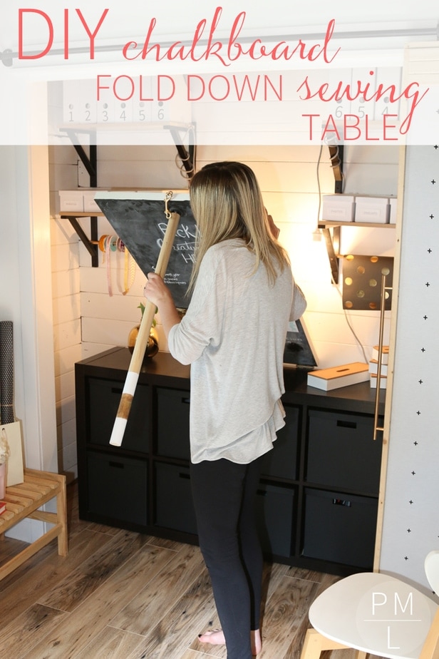 An amazing DIY fold down sewing table that doubles as a cute chalkboard! Such a space saver (as well as easy/inexpensive)