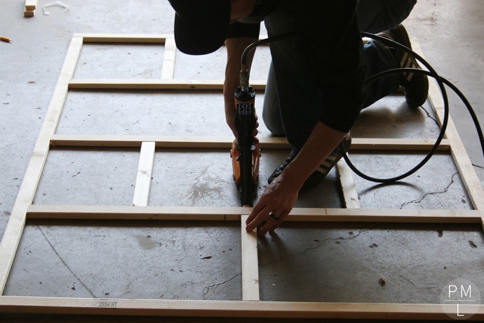 This DIY Sliding Fabric Door is a great idea if you want to save money on a barn door!