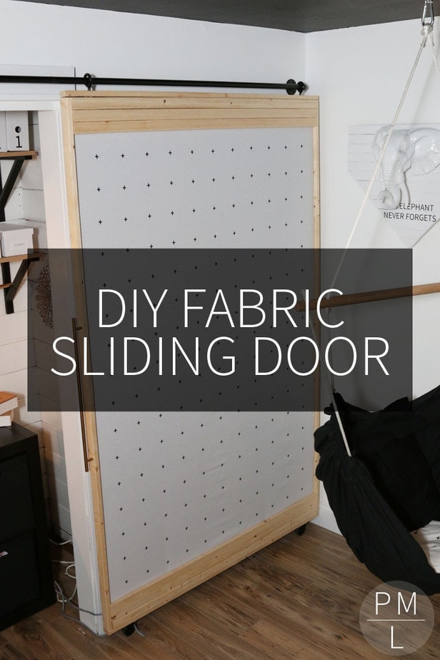 This DIY Sliding Fabric Door is a great idea if you want to save money on a barn door!