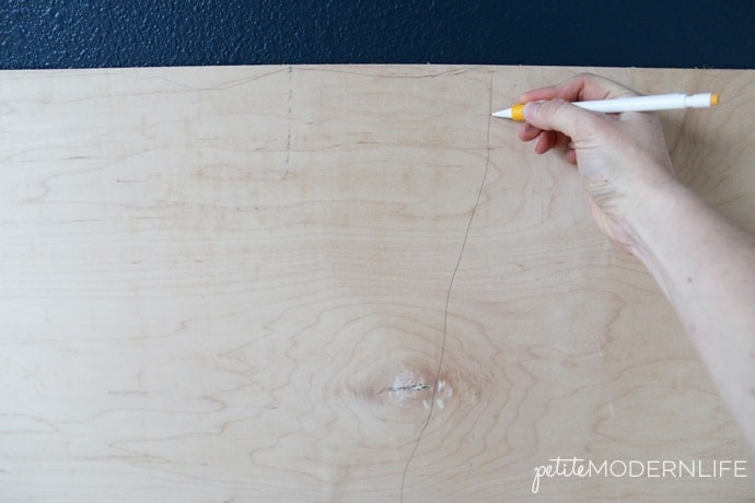 This DIY Live Edge Headboard is so inexpensive and easy to make!