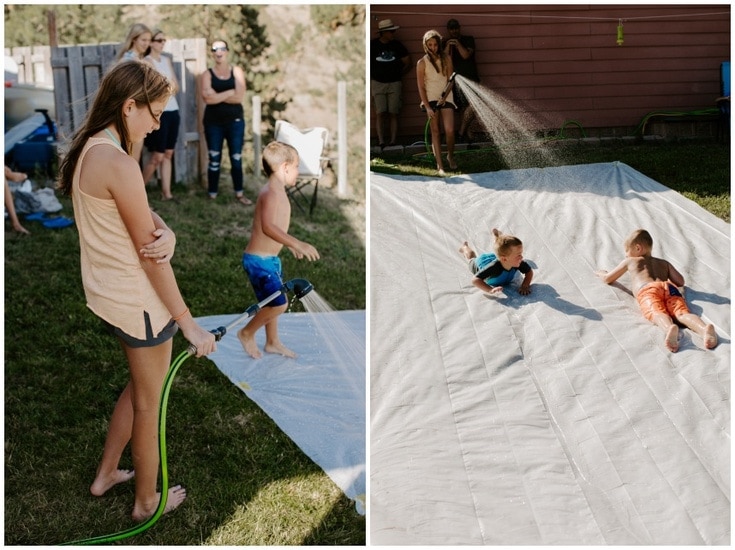 DIY plastic sheeting slip and slide with kids sliding