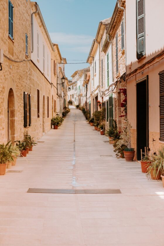 Touring Alcudia's spanish plant lined streets