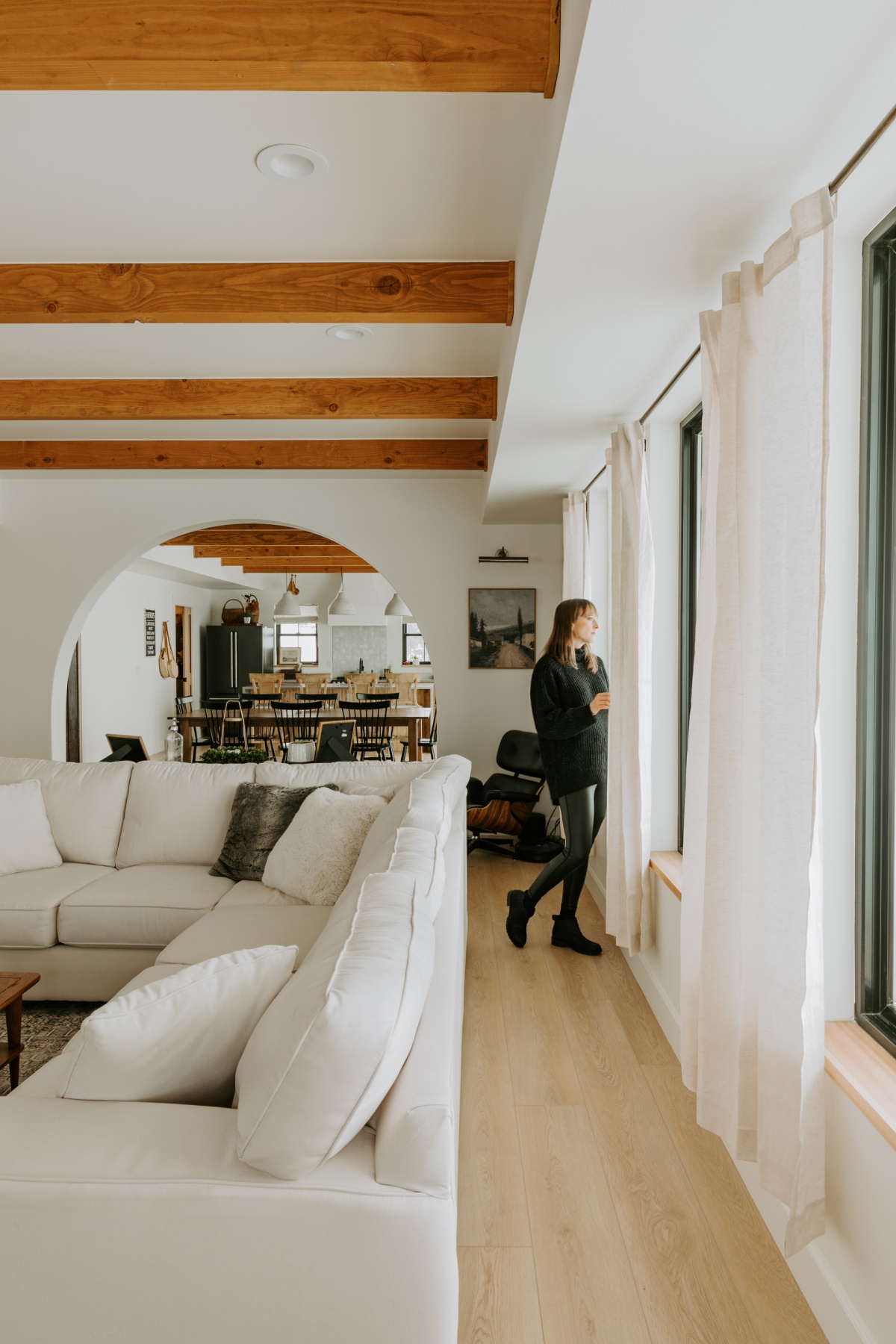 Paradigm Conquest Floors in Estate next to white couch