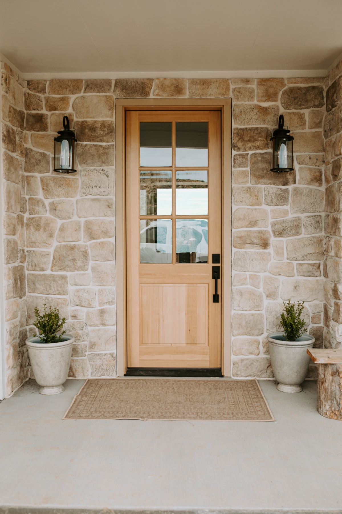 Front porch plant decor and faux stone pots from Walmart